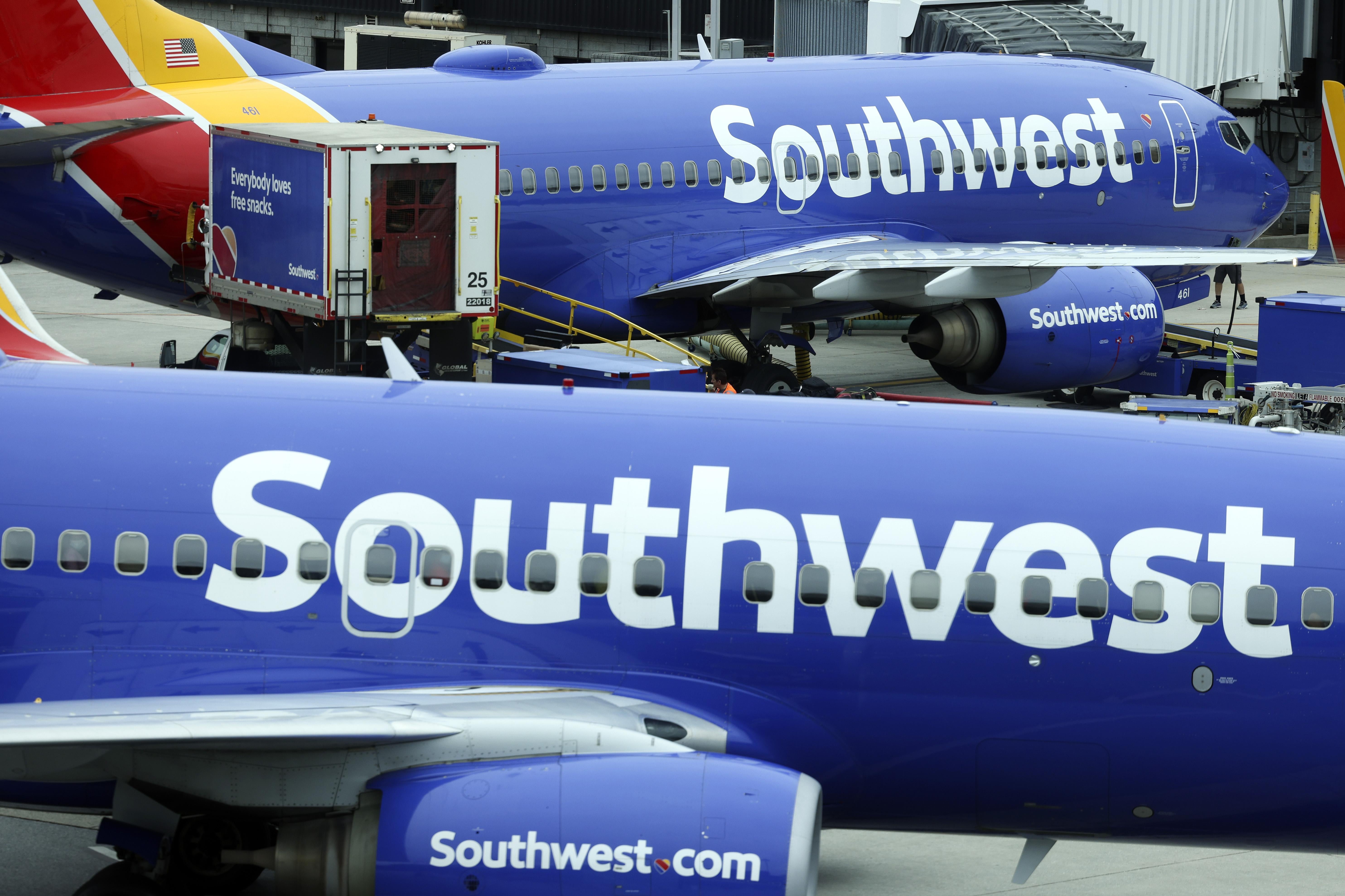 Two Southwest planes at a gate