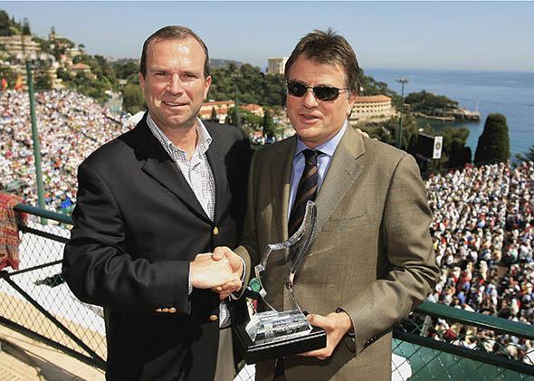 Journalist Neil Harman of the Times of London receives the Roy Bookman media award from Etienne de Villiers, then-chairman of the ATP Tour, during the Monte-Carlo Rolex Masters on April 22, 2006, in Monaco.