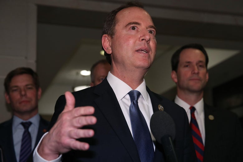 Adam Schiff speaks at a microphone.