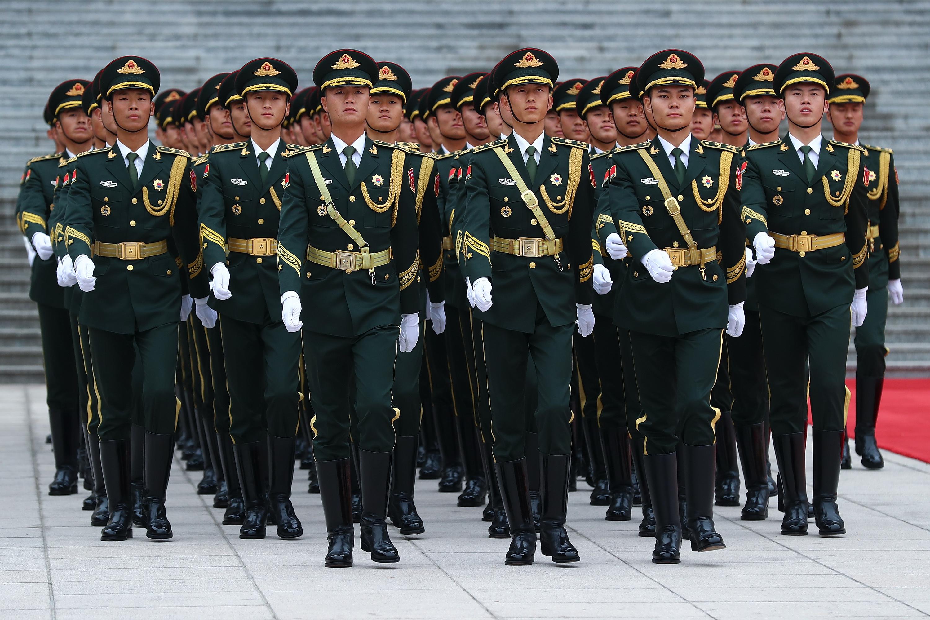 Chinese military honor guards lined up in formation and uniform 