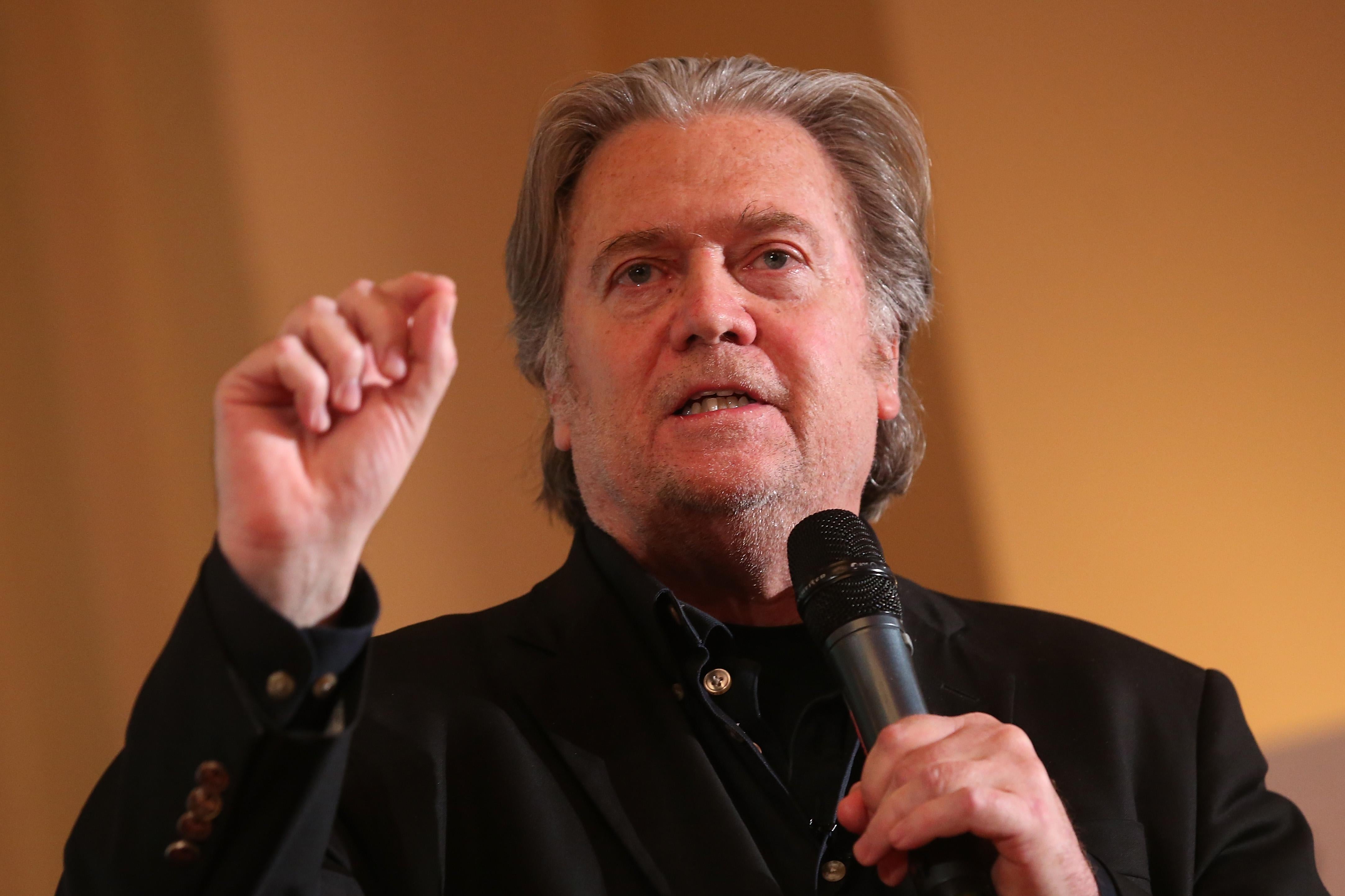 Steve Bannon speaking into a microphone.