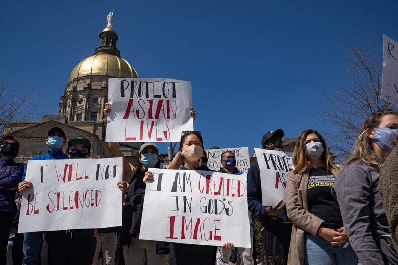 Demonstrators take to the streets to show their support for Asian-American and Pacific Islander communities on March 20, 2021 in Atlanta, Georgia.