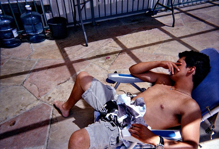 Murillo naps in the sun after a long night of partying at his friends home in Los Angeles, Sept. 16, 2009.