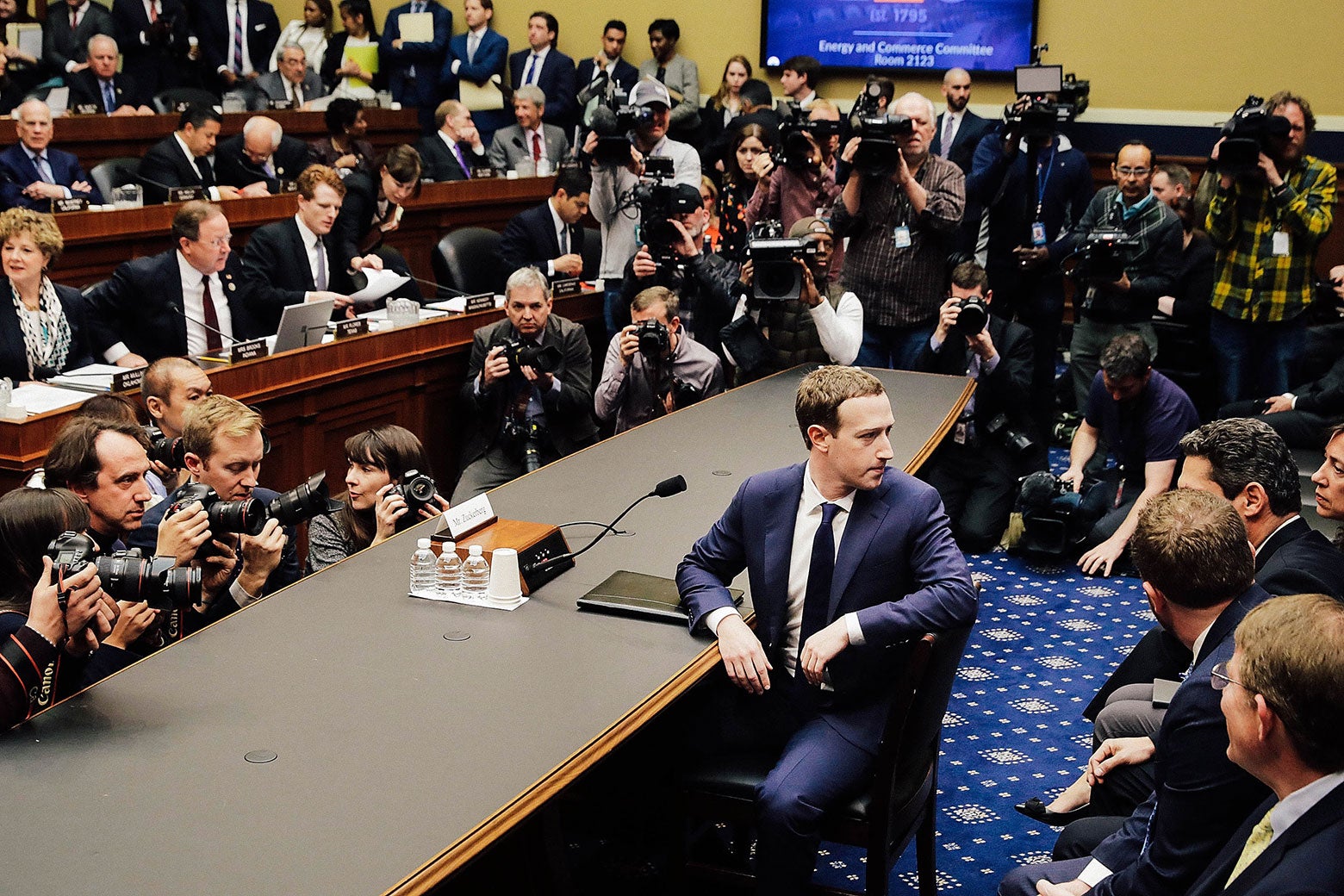 Mark Zuckerberg turns to face the gallery before testifying on Capitol Hill on April 11.