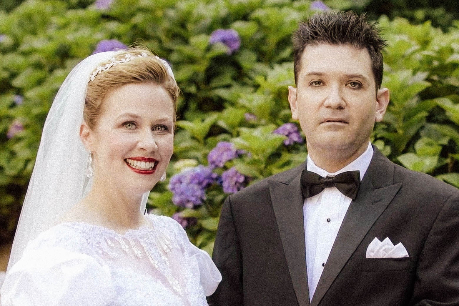 A wedding picture of the murdered bride and suspicious-looking husband from The Husband Did It.