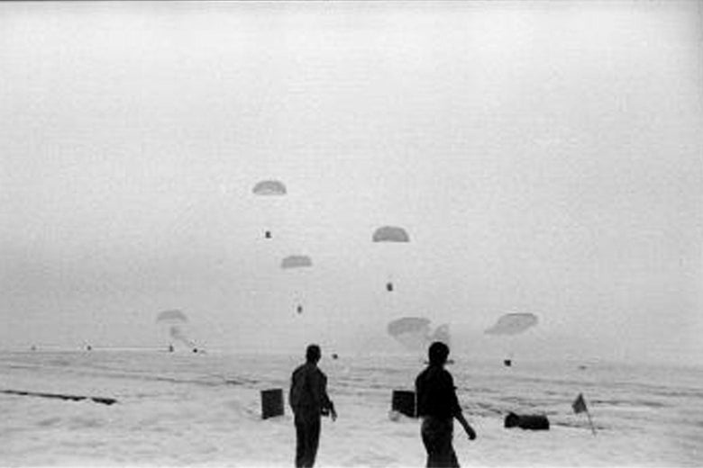 Supplies being airdropped onto the ice.