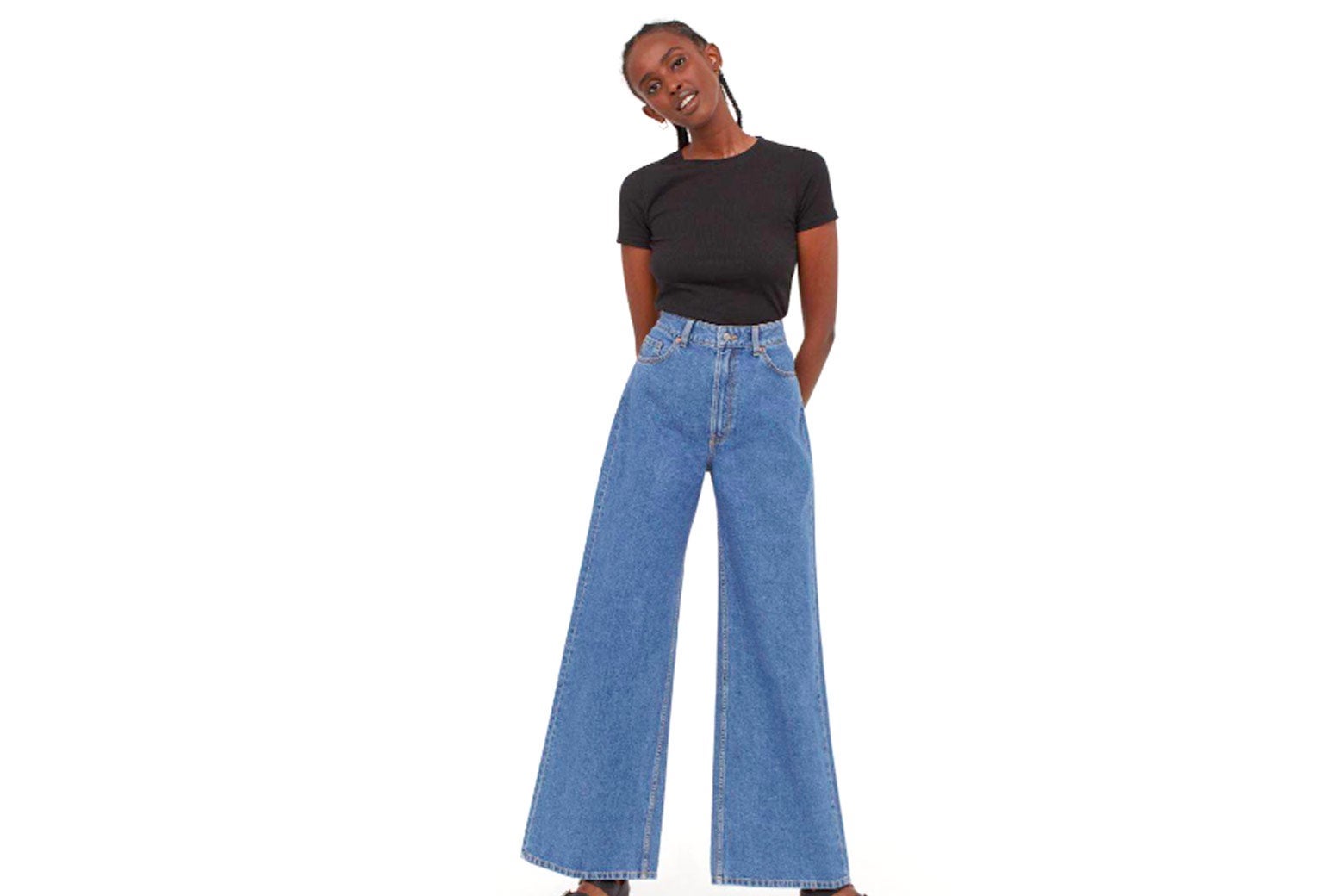 A woman wearing a pair of baggy jeans