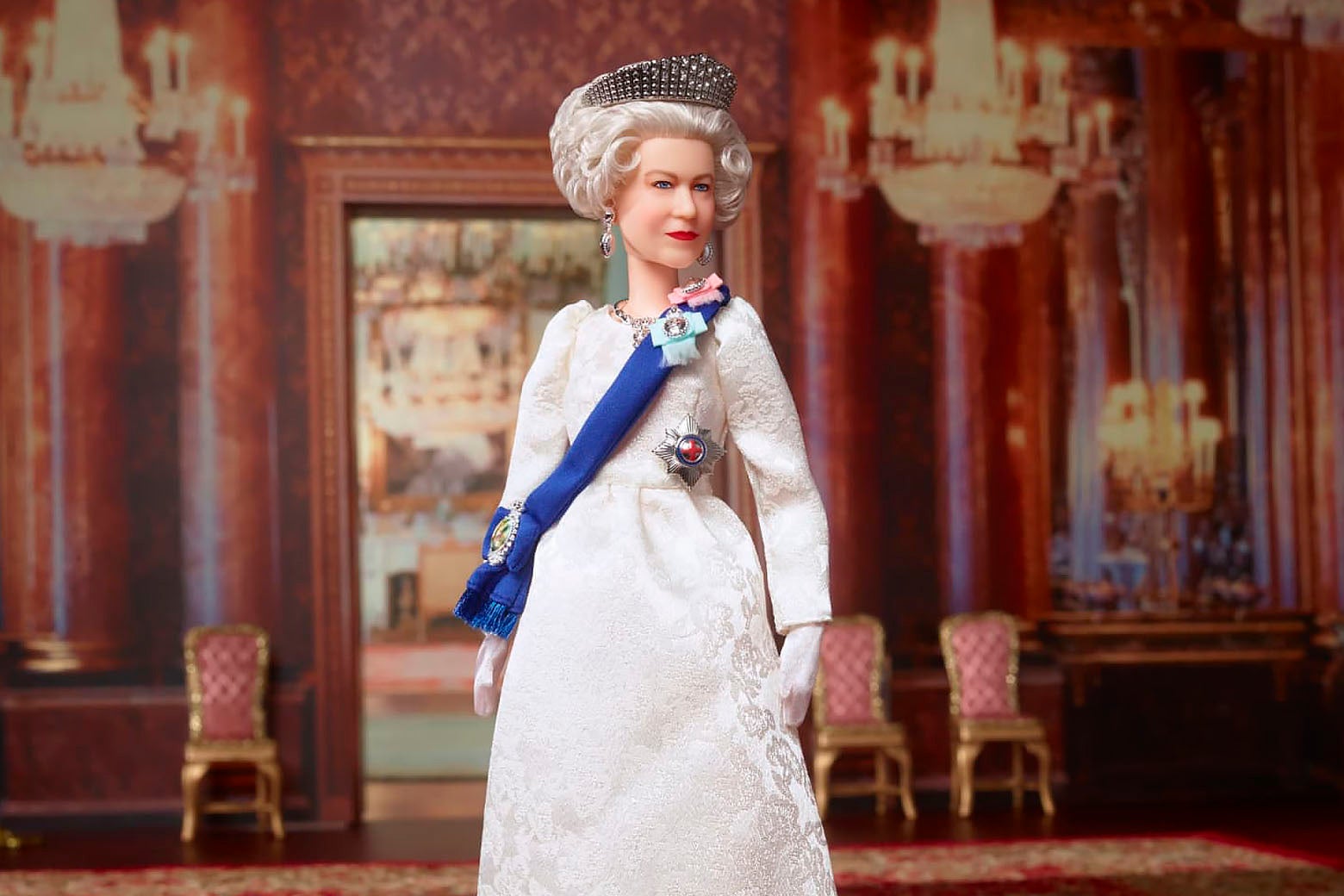 A Queen Elizabeth doll by Mattel in a royal ballroom.