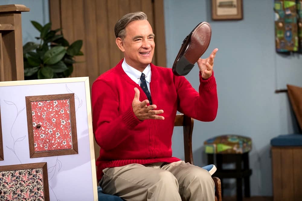 Tom Hanks as Fred Rogers in A Beautiful Day in the Neighborhood.