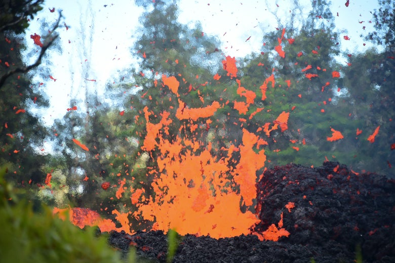 Lava is seen coming from a fissure in Leilani Estates subdivision on Hawaii's Big Island on May 4, 2018. 