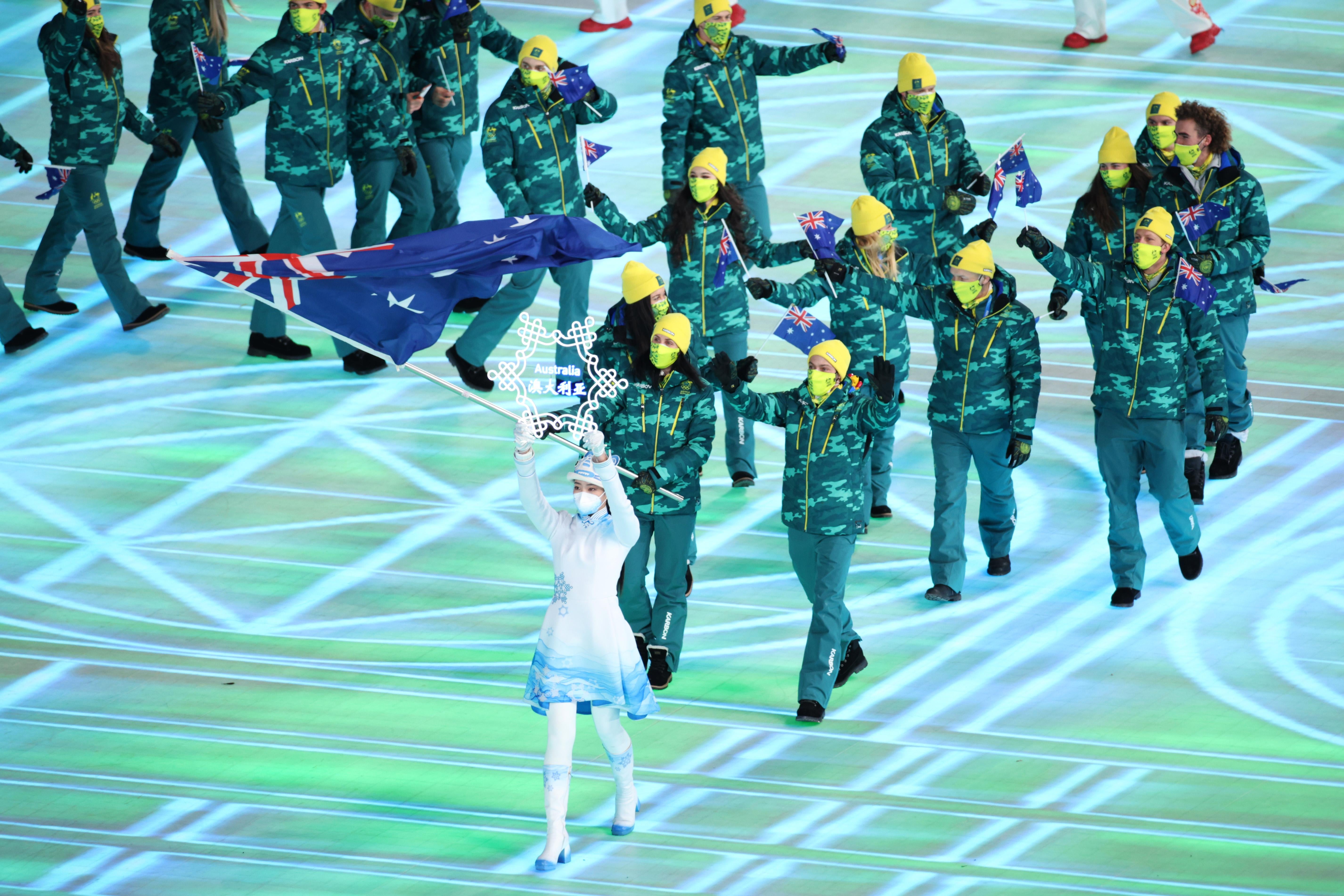 Members of Team Australia march as a group.