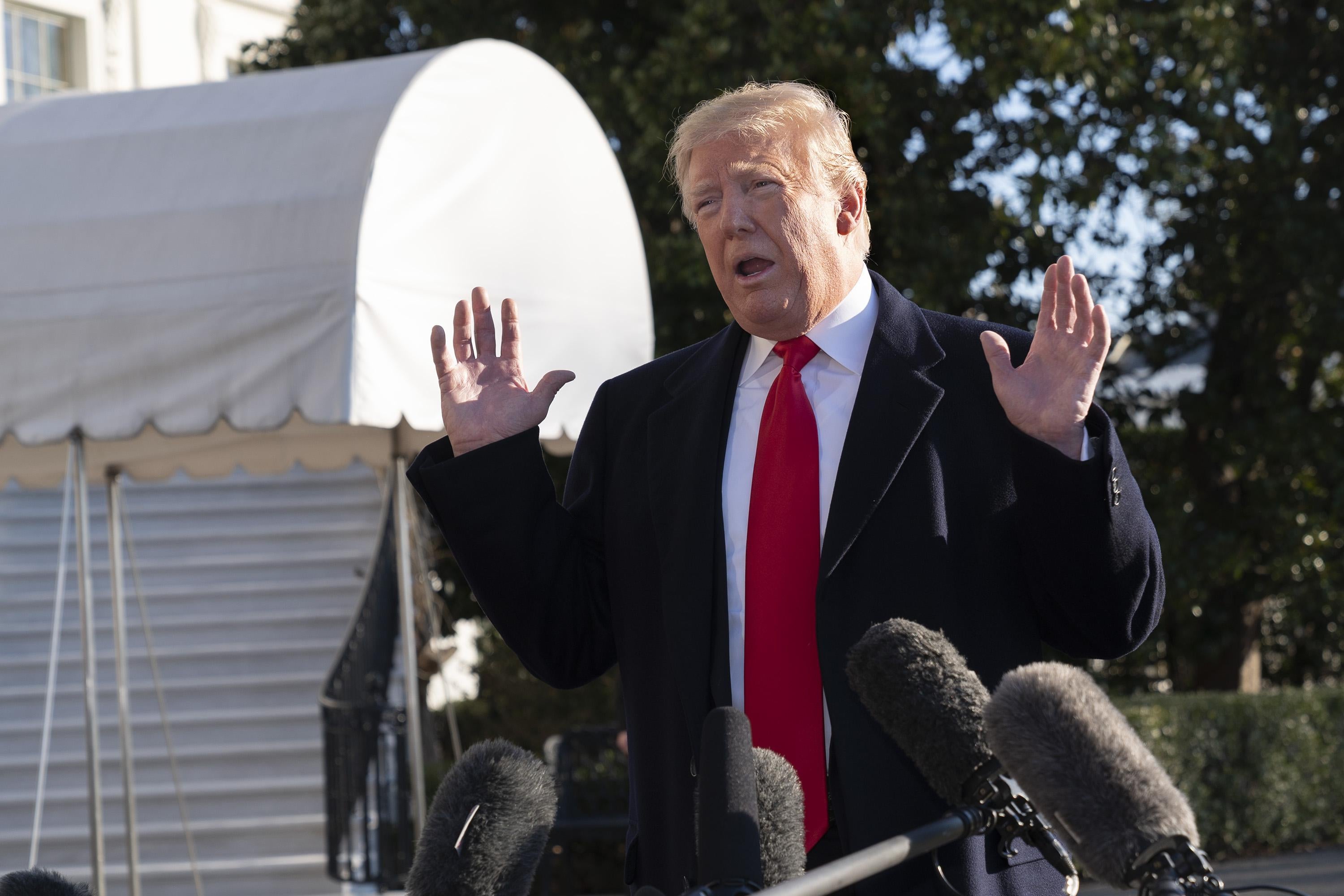 President Donald Trump speaks to the media before departing the White House for Camp David on January 6, 2019 in Washington, D.C. 