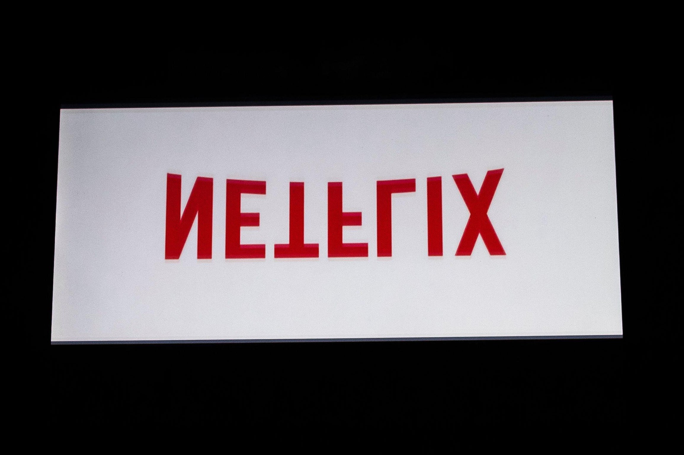 An upside down Netflix logo .