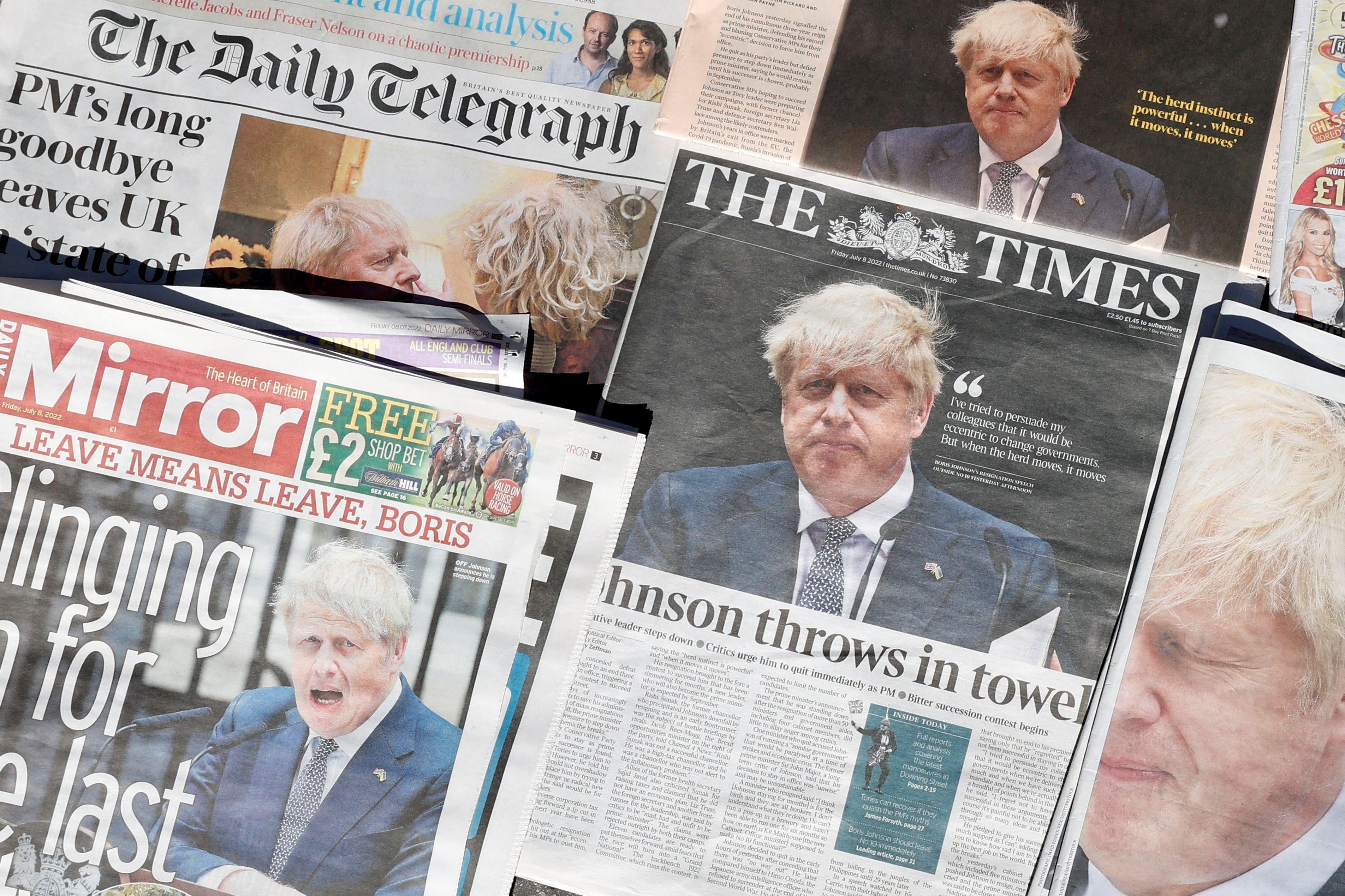 Front pages of British national newspapers, each leading with a front page story of the resignation of Boris Johnson as leader of Britain's Conservative Party, are arranged for a photograph in Downing Street, the official residence of Britain's Prime Minister, in central London on July 8, 2022. - UK Prime Minister Boris Johnson on Thursday quit as Conservative party leader, after three tumultuous years in charge marked by Brexit, Covid and mounting scandals. Johnson, 58, announced that he would step down after a slew of resignations this week from his top team in protest at his leadership but would stay on as prime minister until a replacement is found. (Photo by CARLOS JASSO / AFP) (Photo by CARLOS JASSO/AFP via Getty Images)