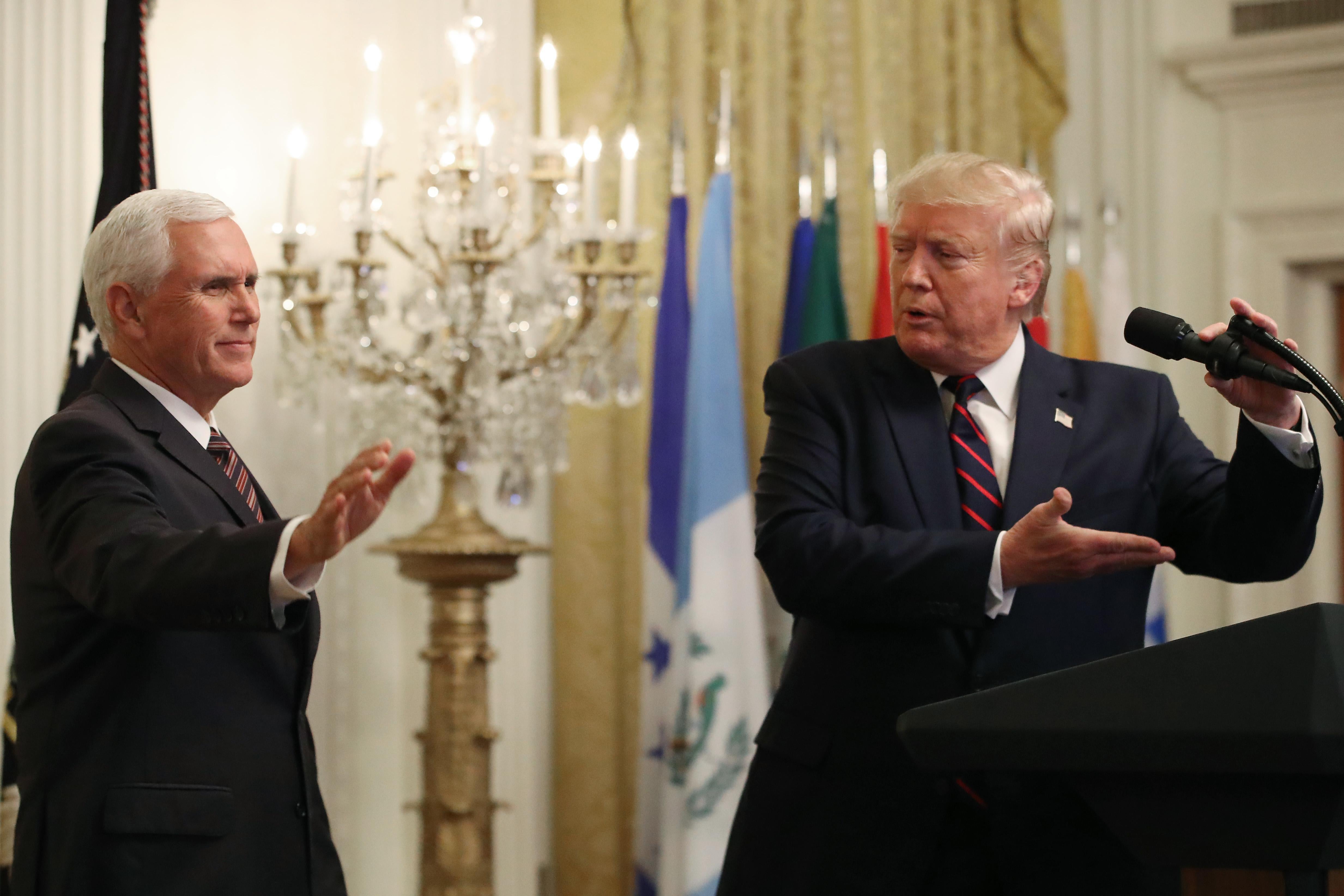 President Donald Trump invites Vice President Mike Pence to speak during a reception to honor Hispanic Heritage Month, in The East Room at the White House on September 27, 2019 in Washington, D.C.