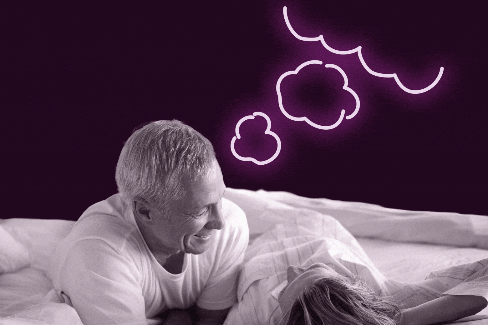 A person smiles at another person in bed. An illustrated thought bubble appears above their head.