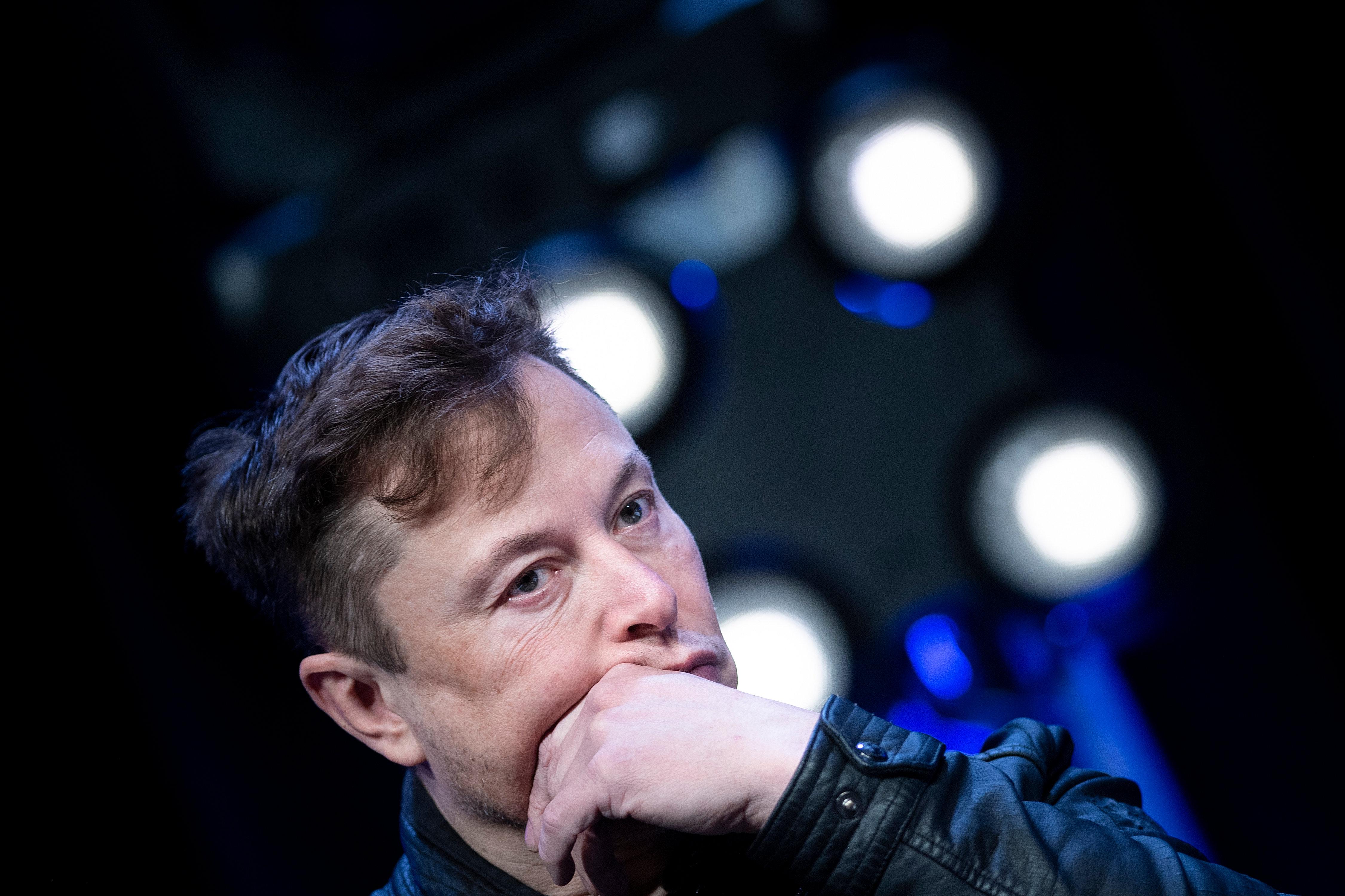 Elon Musk listens to a question during the Satellite 2020 at the Washington Convention CenterMarch 9, 2020, in Washington, D.C. 