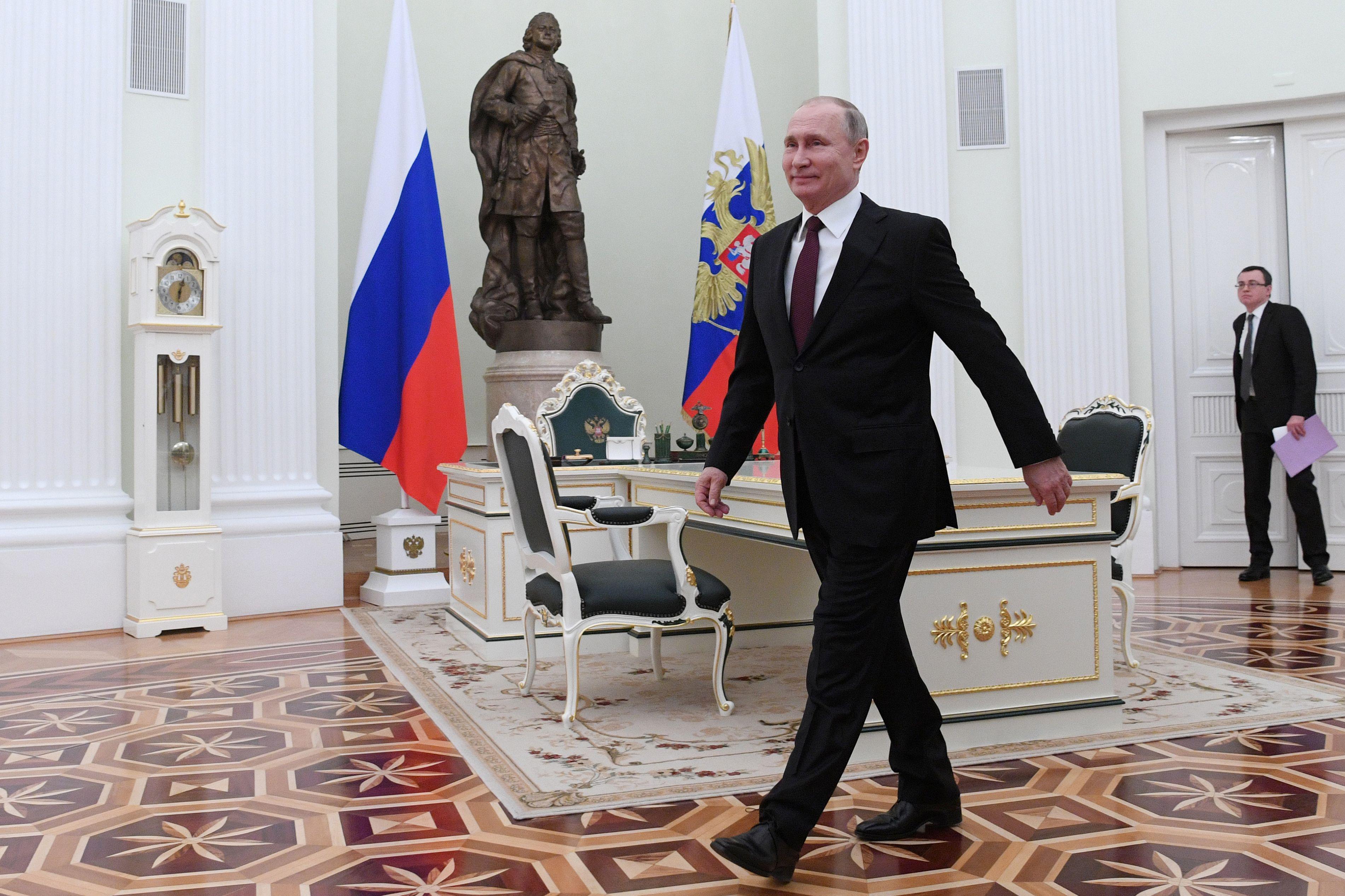 Russian President Vladimir Putin arrives for a meeting with his Belarus counterpart at the Kremlin, in Moscow, on December 29, 2018. 
