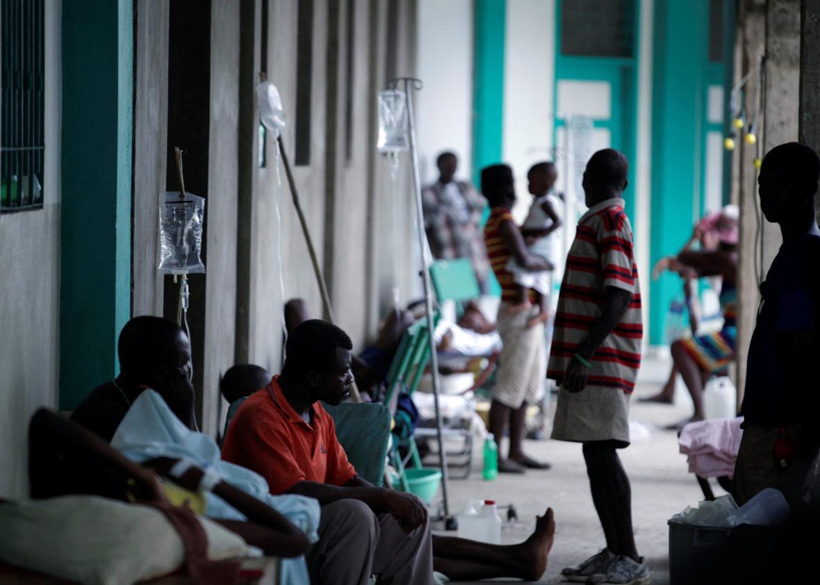 Relatives and patients treated for cholera after Hurricane Matthew in the Hospital of Port-a-Piment, Haiti, October 9, 2016.