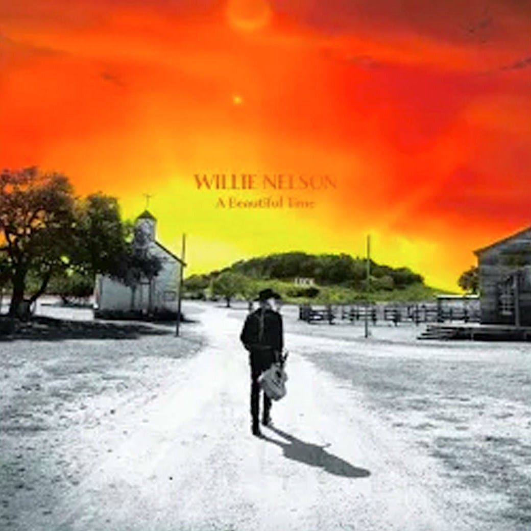 The cover art is Willie Nelson in an old western town against a very orange sky. 