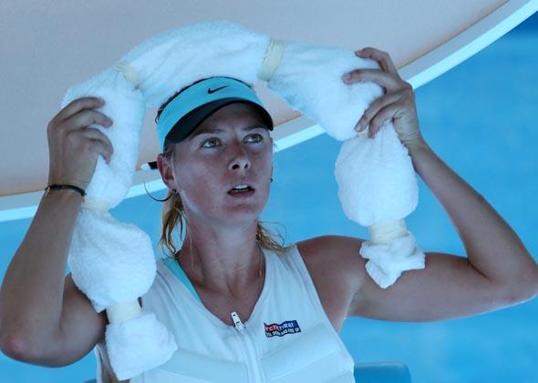 Maria Sharapova of Russia cools off during a break at the 2014 Australian Open on Jan. 16, 2014 in Melbourne, Australia. 