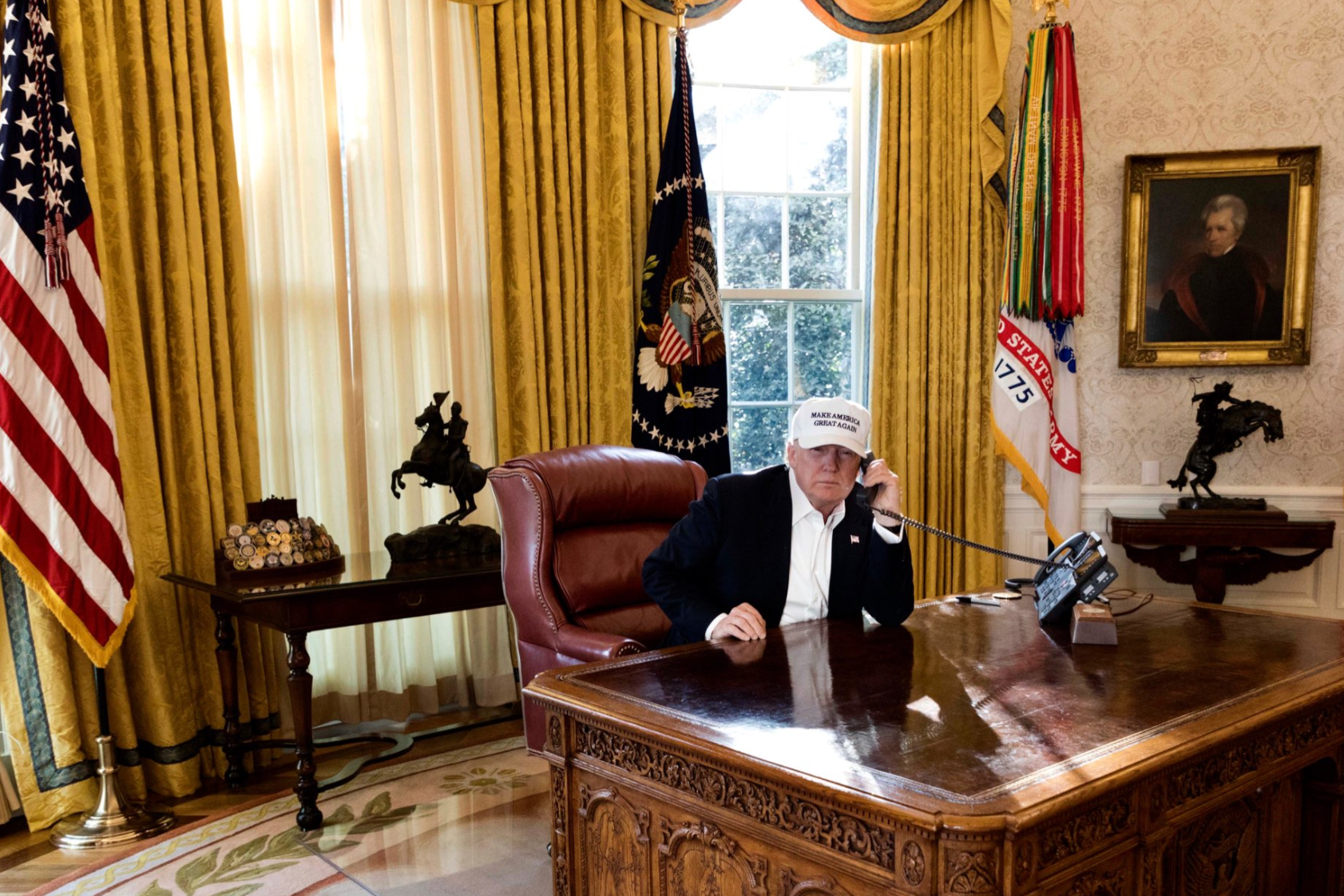President Donald Trump is seen "working" in this photo released by the White House on Jan. 20, 2018.