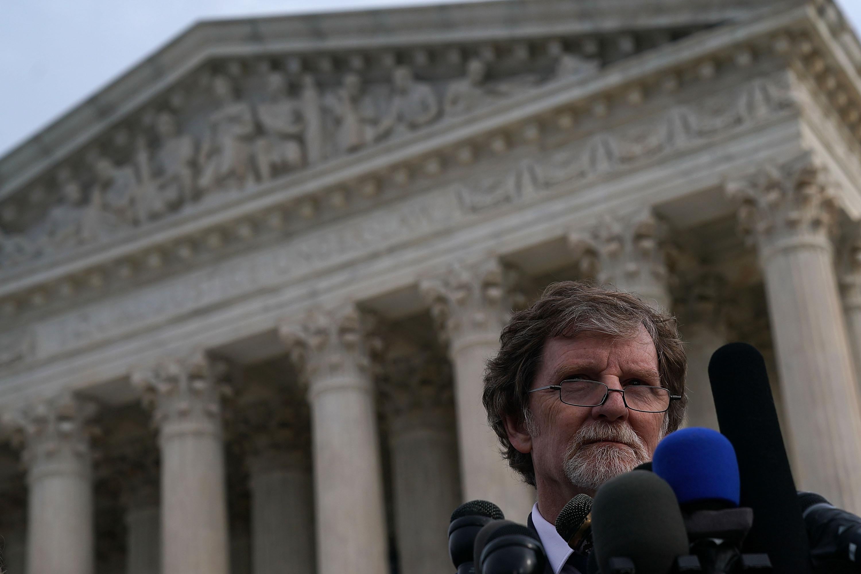 Masterpiece Cakeshop owner Jack Phillips speaks into microphones in front of the U.S. Supreme Court December 5, 2017 in Washington, DC. 