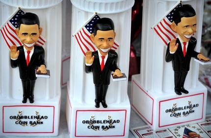 Obama coin banks are for sale near the Time Warner Cable Arena in Charlotte, North Carolina.