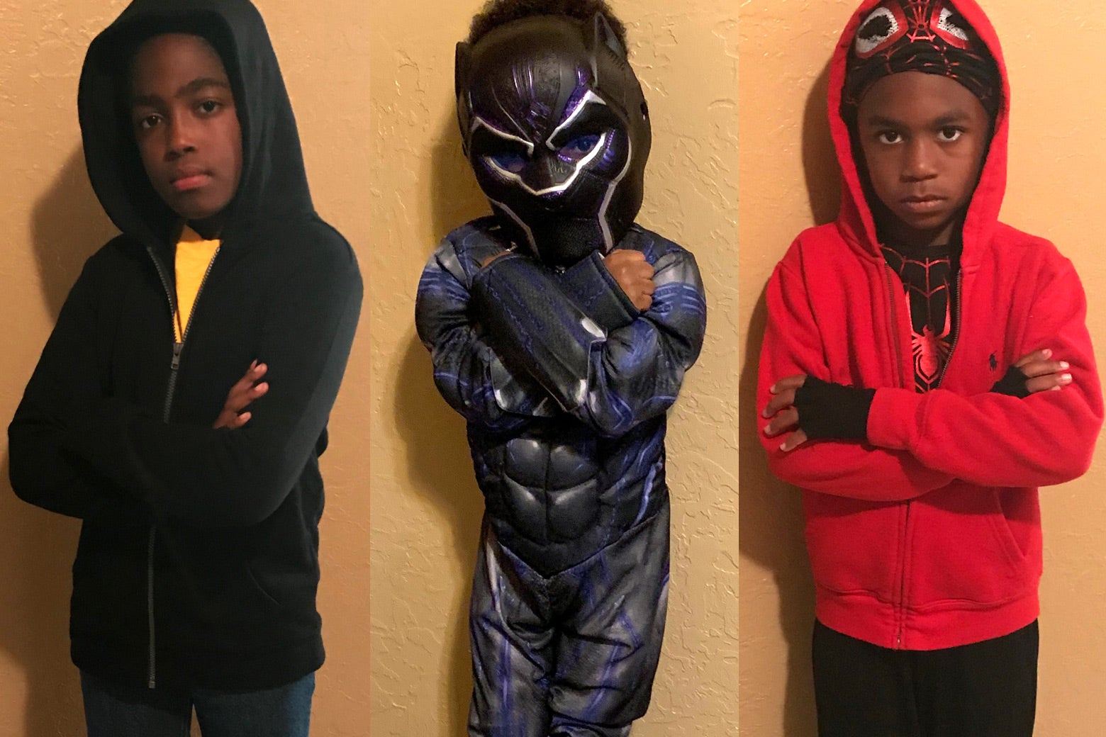 Lawrence Ware's children dressed as Luke Cage, Black Panther, and Miles Morales.