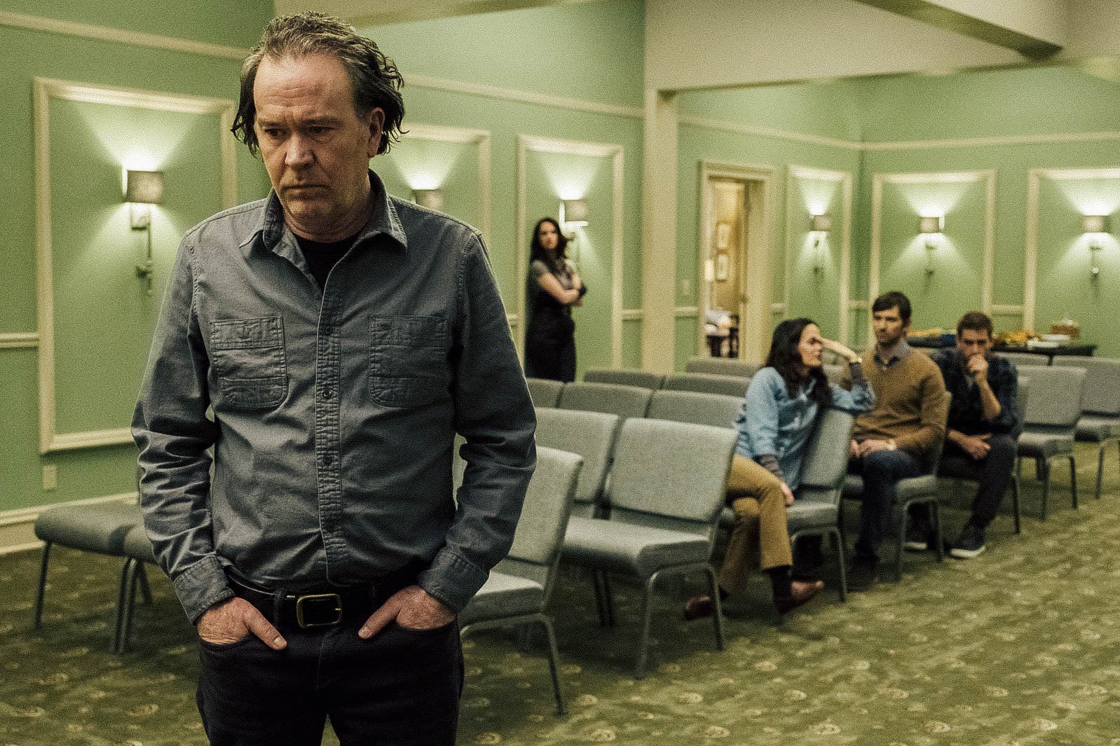 Timothy Hutton stands apart from the rest of his cast family in The Haunting of Hill House.