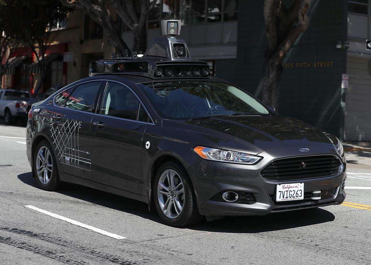 An Uber self-driving car drives.