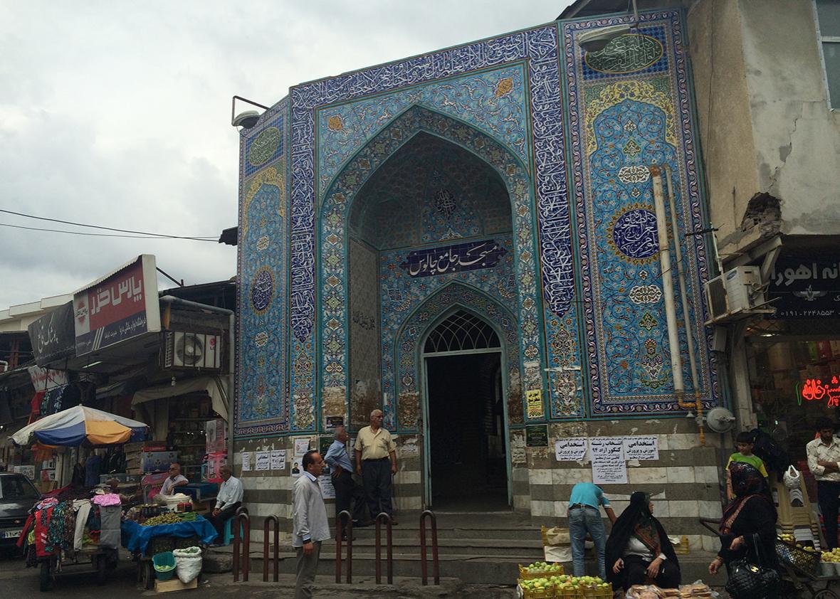 A small mosque in the traditional Iranian style in the center of Chalus' small bazaar, dominated by local farmers.