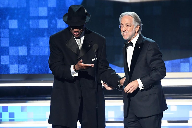 Jimmy Jam (L) and President and CEO of The Recording Academy Neil Portnow speak onstage during the 61st Annual GRAMMY Awards at Staples Center on February 10, 2019 in Los Angeles, California. (Photo by Kevin Winter/Getty Images for The Recording Academy)