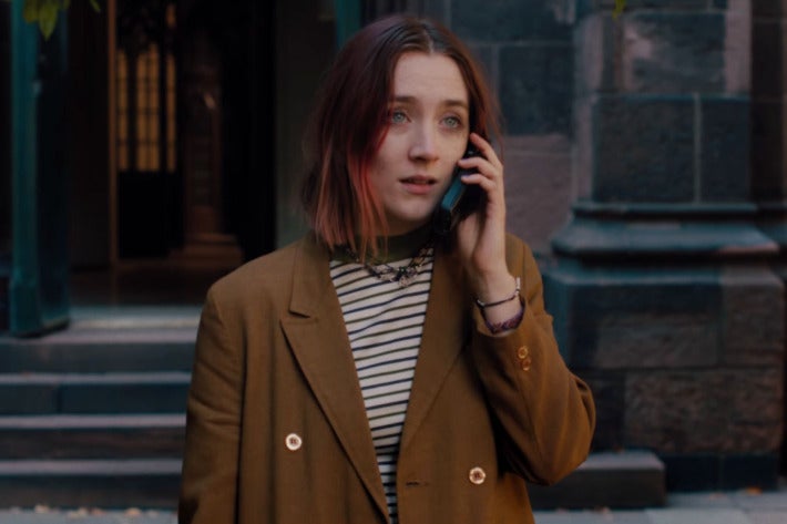 Saoirse Ronan as Lady Bird, holding a cell phone to her ear
