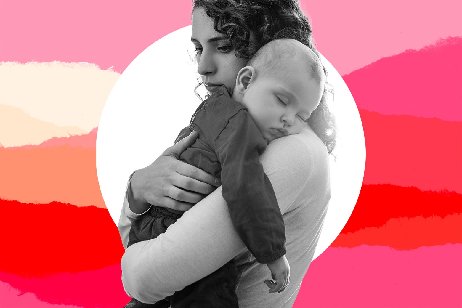 A woman holding a sleeping baby.