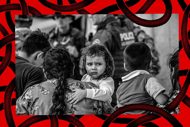 A photo illustration with a young immigrant girl looking at the camera, being carried by an adult as they wait to be interviewed by U.S. Border Patrol agents after they were taken into custody on July 02, 2019 in McAllen, Texas.
