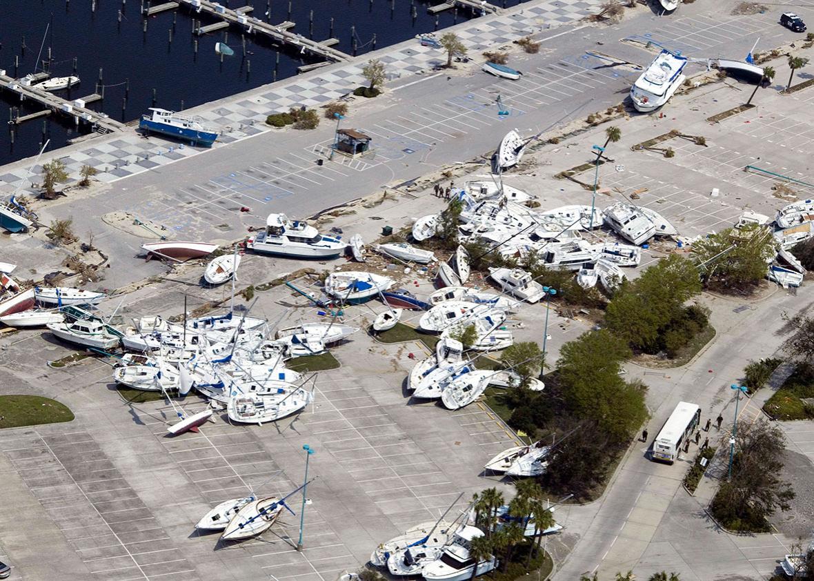 A pile of yachts sit in a parking lot for the marina along Lake ,A pile of yachts sit in a parking lot for the marina along Lake Pontchartrain.