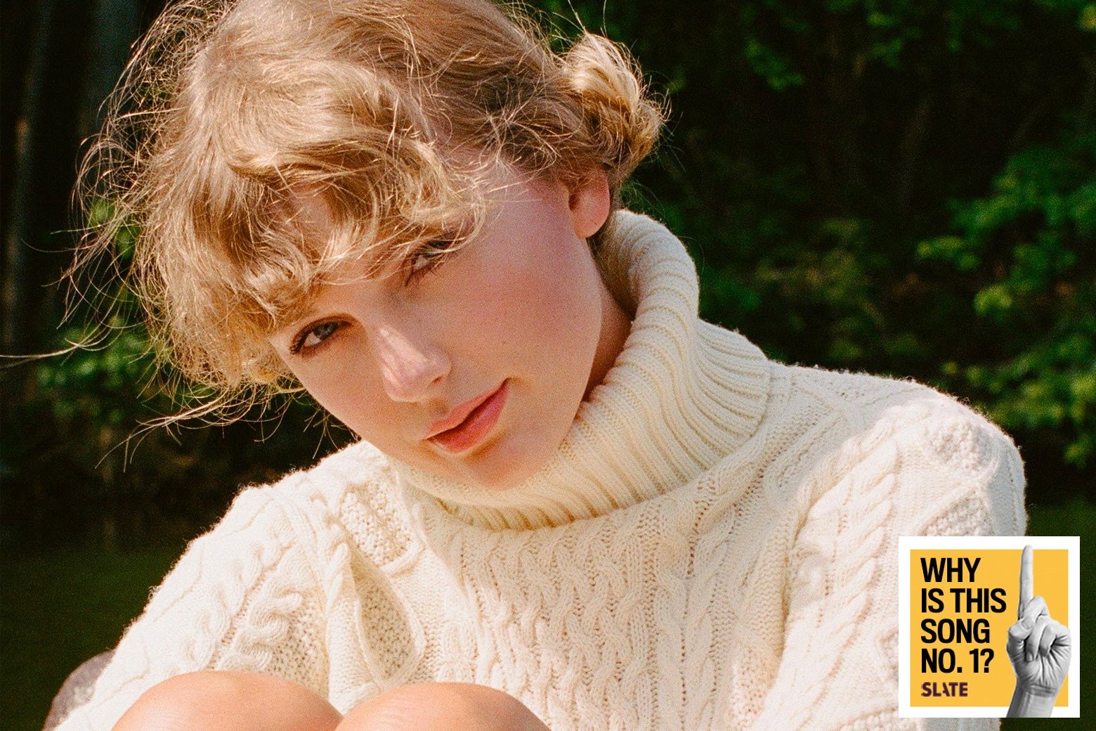 Taylor Swift in a chunky sweater.