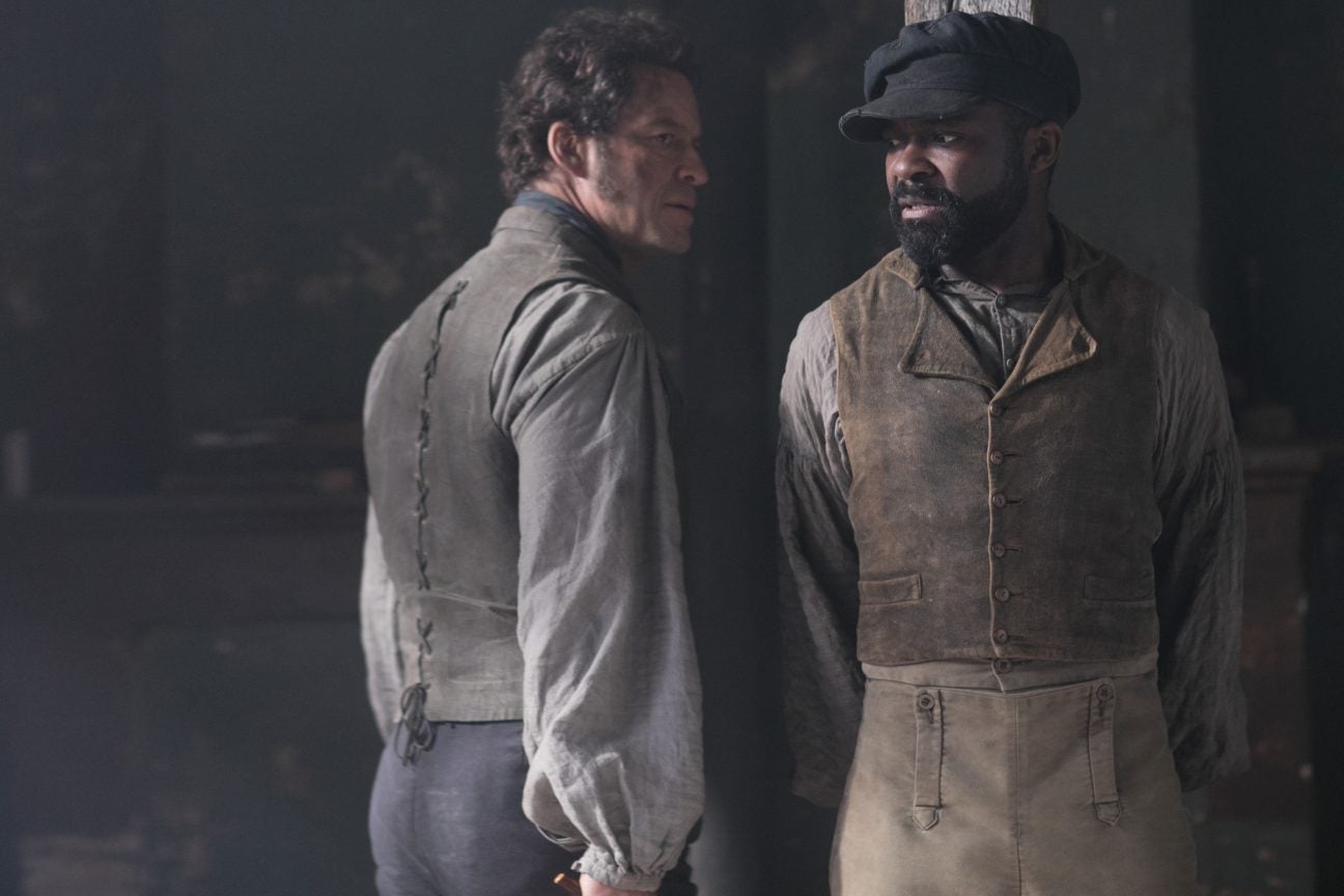 Dominic West as Jean Valjean and David Oyelowo as Javert.