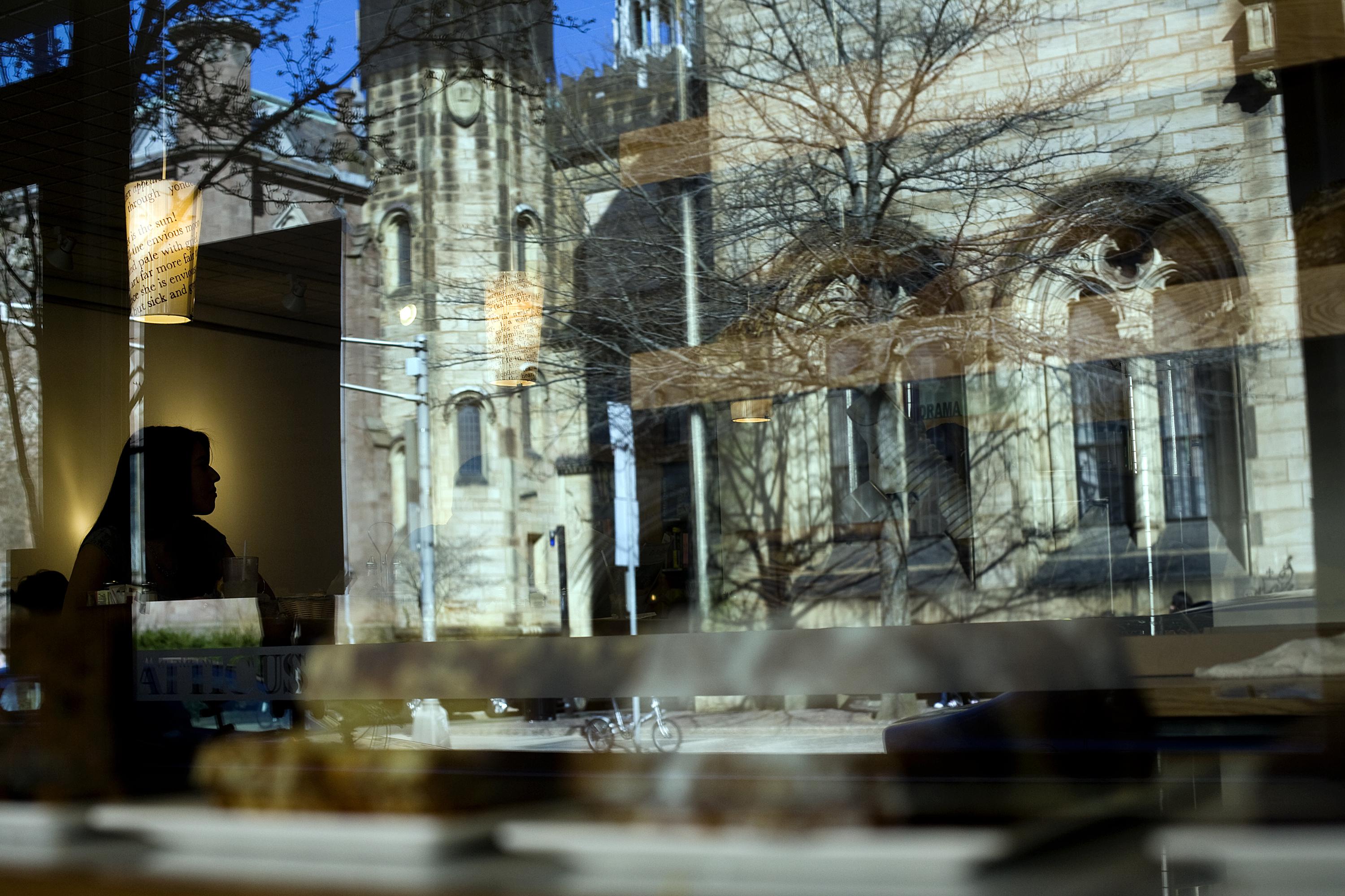 Patrons sit in the cafe of Atticus Bookstore which overlooks the Yale Campus on Chapel Street April 16, 2008 in New Haven, Connecticut. 