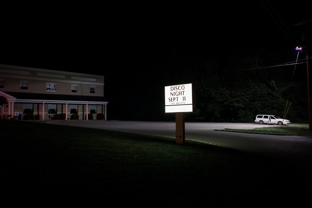 A sign outside Arbor Ridge Catering and Banquet Hall advertising a 1970s-style Disco Night. An ad for the event promised:Dress your retro best and boogie on down!Break out your bell-bottoms and polish your platforms!There will be prizes for Best Dressed and Best Dancer.HOPEWELL JUNCTION, NEW YORK. USA. 2010