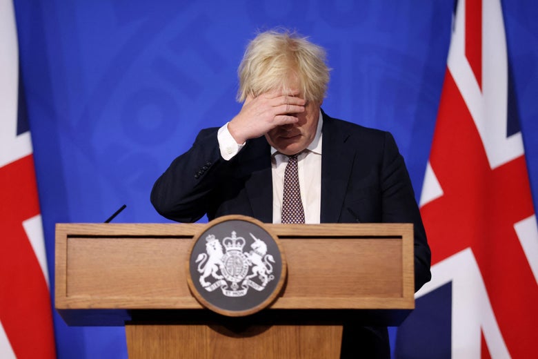 Britain's Prime Minister Boris Johnson gestures as he attends a media briefing on the latest Covid-19 update in the Downing Street briefing room, central London on November 27, 2021.