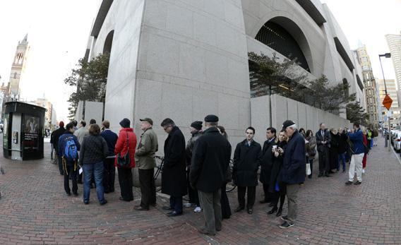 Voters line up to cast their vote in Boston