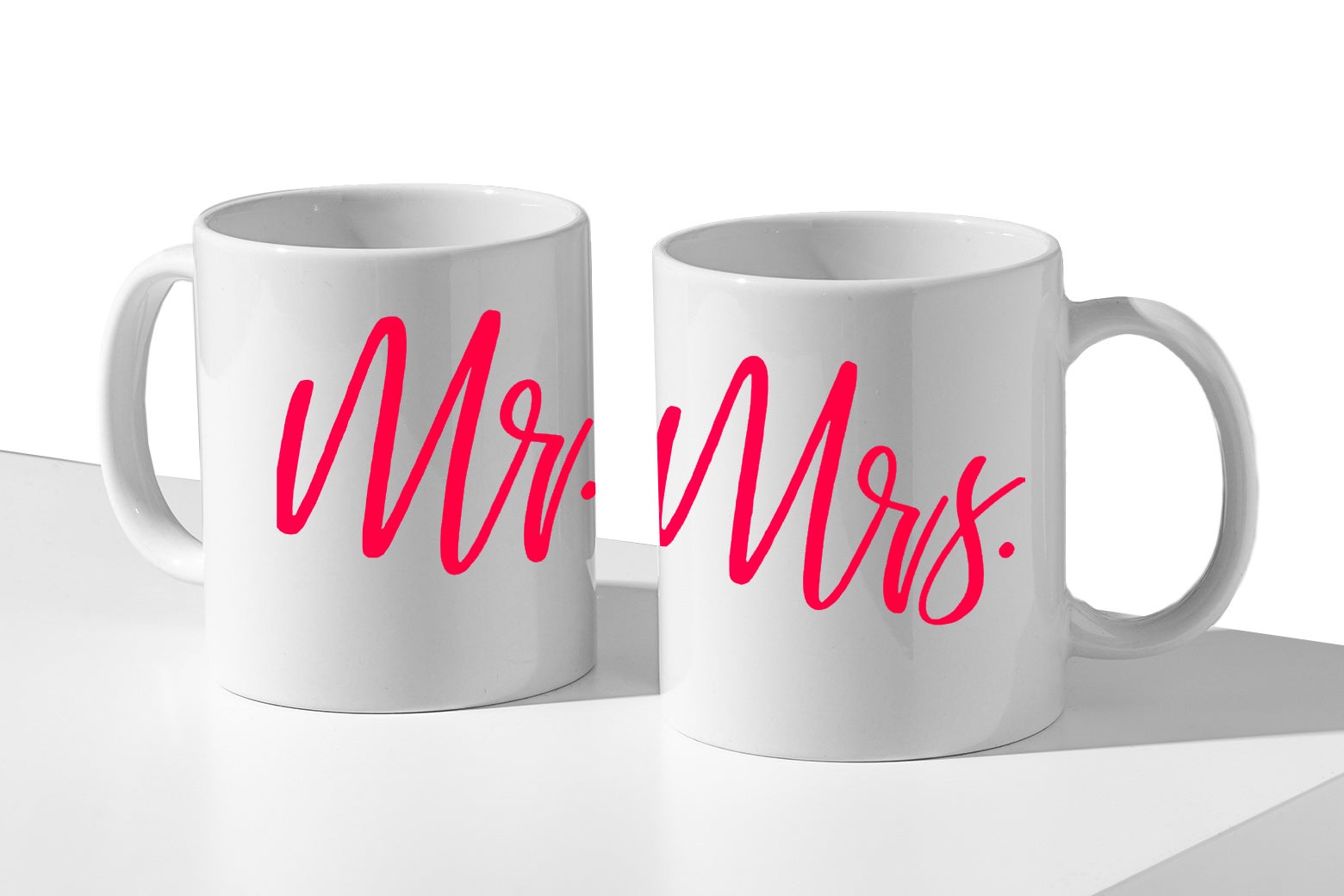 Two mugs that say Mr. and Mrs.