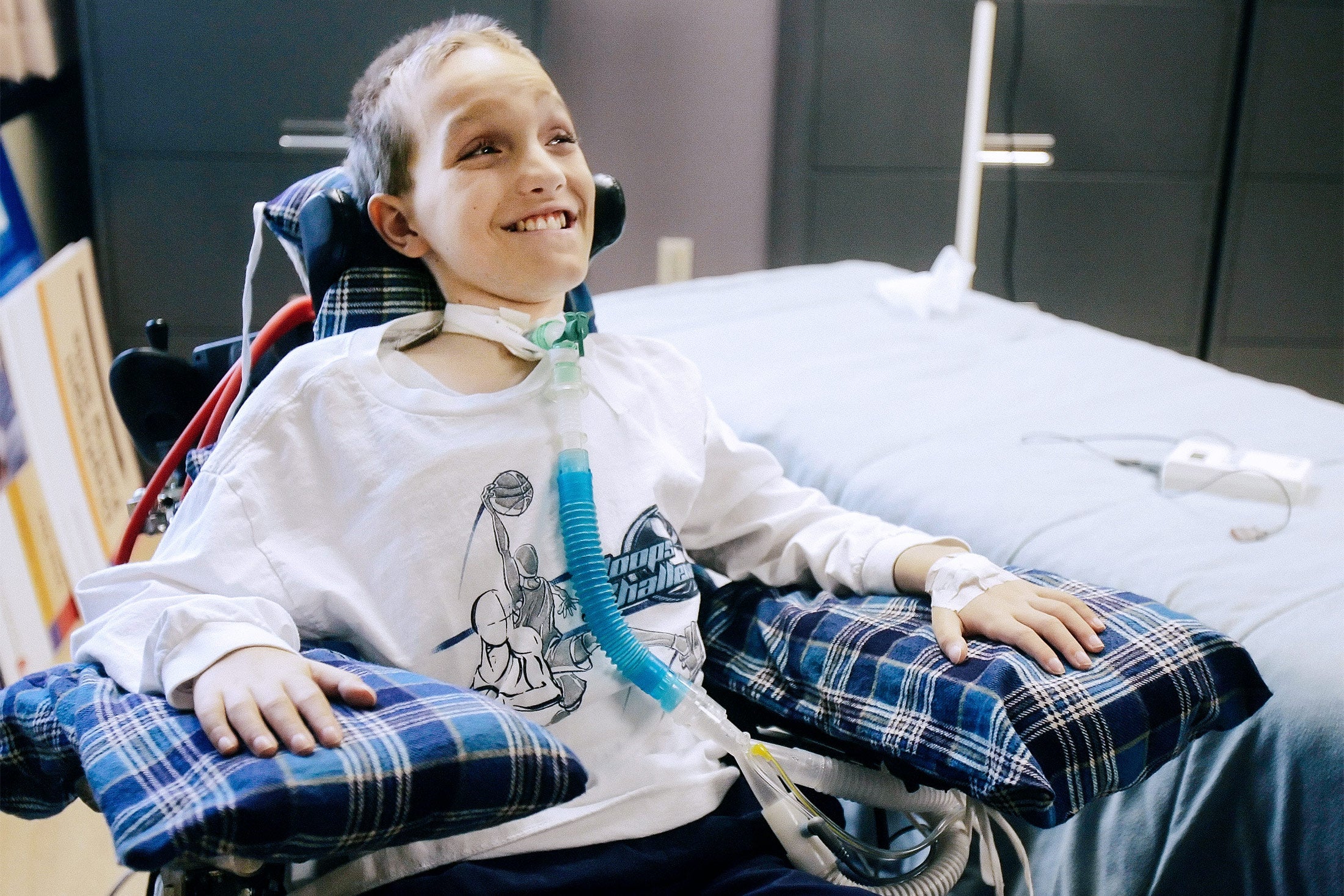 Alex Malarkey smiling in a hospital room.