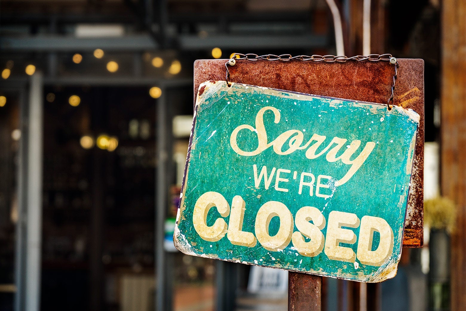 A sign says, "Sorry, we're closed."