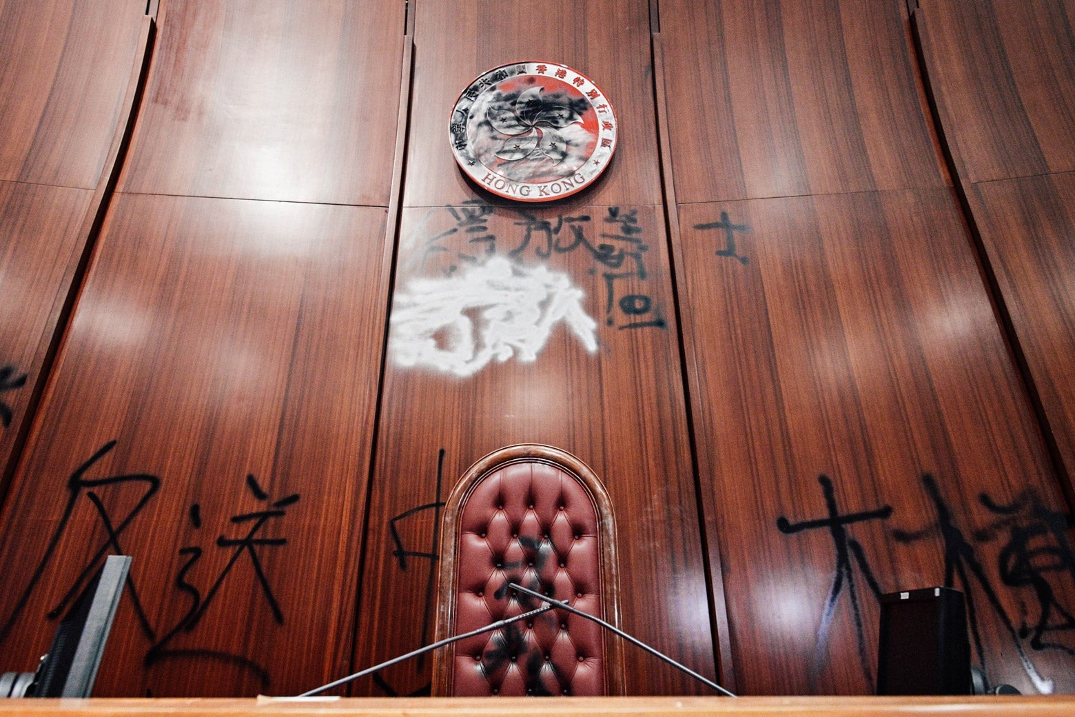 Graffiti is seen in the main chamber of the Legislative Council in Hong Kong.
