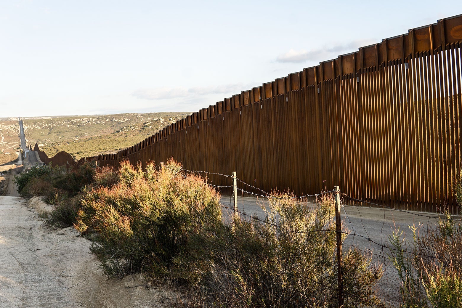 Trump's border wall construction has halted, but the harm remains.