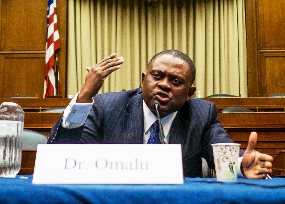 Forensic pathologist and neuropathologist Dr. Bennet Omalu participates in a briefing sponsored by Rep. Jackie Speier on Capitol Hill on January 12, 2016 in Washington, DC.
