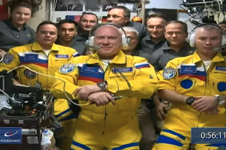 Three Russian cosmonauts Oleg Artemyev, Denis Matveev and Sergey Korsakov have arrived at the International Space Station on Friday March 18, 2022 docking their Soyuz capsule and being seen wearing flight suits in yellow and blue colors that match the Ukrainian flag. 